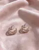 Nuevos pendientes de clip de alta gama de circonita para mujeres sin perforaciones, simples y elegantes, pendientes de estilo europeo y americano únicos