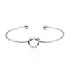 Pulseira de Aço Titânio com Nó Concentrico da Fábrica, Pulseira Aberta Simples de Laço de Amor, Joia Versátil Feminina em Estoque