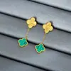 Nuevo Collar de Acero de Titanio con Trébol de Cuatro Hojas de Oro de 18 Quilates Conjunto de Tres Piezas de Collar, Pulsera y Pendientes de Flor de Cuatro Hojas para Mujer Collar de Nácar Venta al por Mayor