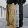 2026 Pantalones Casuales de Verano para Hombre Transfronterizos de Color Sólido con Múltiples Bolsillos Elegantes Sueltos de Pierna Recta Ropa de Trabajo Versátiles Pantalones Largos Venta al por Mayor