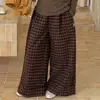 Conjunto de Chaleco de Cuero y Pantalones para Niñas 2026 Nuevas Llegadas de Otoño Tallas Mediana y Grande Estilo Coreano Pantalones de Pierna Ancha a Cuadros Conjunto de Tres Piezas en Capas