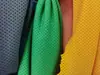 Um grande número de colete de lazer de tecido com furos elásticos baixos para pontos, colete de praia, camiseta esportiva respirável, tecido que absorve a umidade