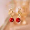 Pendientes Angora Rojos Geométricos con Goteo de Aceite Otoño e Invierno, Pendientes Retro de Nicho de Alta Gama Estilo Hong Kong, Pendientes de Lujo Ligero con Temperamento para Mujer