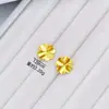 Mismo estilo que la joyería de oro arena oro pendientes de botón trébol de cuatro hojas pendientes simples de moda pendientes de nicho de lujo ligero de moda pendientes de estilo chino nuevo