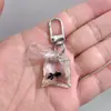 SHEIN TEMU Chaveiro Explosivo Peixe Dourado Transparente Peixinho Chaveiro de Resina Pingente de Joia Acessórios