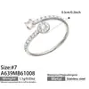 Anillo de Nariz Tipo Nariz de Cerdo de Cuatro Hojas con Circonita Cúbica Engastada en Bisel Cuadrado Acero Inoxidable Chapado en Oro de 18 Quilates Joyería de Lujo Ligero Europea y Americana de Alta Gama para Mujeres