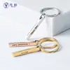 Llavero de barra cuadrada de acero inoxidable de color contrastante exclusivo transfronterizo para letras DIY nombre de familia regalo de Navidad fabricante