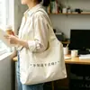 Bolsa colete de lona de alta qualidade com logotipo personalizado, bolsa tote de lona espessa, bolsa para estudante e para o dia a dia, atacado de bolsas colete