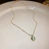 Collar geométrico de acero de titanio con circonita esmeralda, temperamento de moda europea y americana, cadena para clavícula, nicho, sentido de alta gama, collar al por mayor para mujer