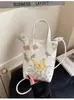 Bolsa de Lona Bordada Versátil Nueva 2026 Transfronteriza para Mujer, Bolso Cruzado de Primavera, Estilo Coreano Celebridad de Internet Popular de Nicho para Teléfono