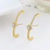 Aretes C-Shaped para Mujer con Estrella de Ocho Puntas e Incrustaciones de Diamante, Forma de Arco, Estilo Celebridad Nicho Europeo y Americano, Mismo Modelo que en Xiaohongshu