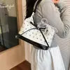 Bolso de hombro de gran capacidad, nicho, versátil, elegante, con estampado de lazo patchwork de color contrastante, nuevo de moda verano 2026