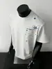 Camiseta Masculina de Manga Curta com Estampa de Flocos de Neve e Estrelas, Tendência Nacional High Street Americana, Novo Estilo Verão 2026, Camiseta Masculina Solta de Meia-Manga