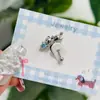 Brincos de Gatinho Fofos Feitos de Aço Titânio, Estilo Kawaii, Versáteis, Frescos e Doces, com um Pequeno Laço na Orelha de Gatinho