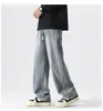 Comércio exterior estilo Hong Kong moderno masculino verão novo 2026 jeans com letras hip-hop ins tendência moda de rua legal e estiloso