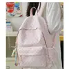 Mochila nueva y elegante estilo coreano para niñas, mochila fresca de lunares en colores caramelo, bolsa ligera de doble hombro para estudiantes de secundaria y preparatoria