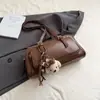 Nova Bolsa Baguete Retrô de Alto Padrão Outono/Inverno 2025, Bolsa de Ombro de Nicho, Versátil para o Dia a Dia, Grande Capacidade, Bolsa de Mão e Bolsa de Ombro