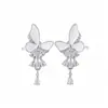 Danza de Mariposas y Luz Fluida~Aretes de Borla de Zirconia con Mariposa de Esmalte Blanco, Aretes de Alto Nivel Estilo Hada Francesa con Diseño de Nicho