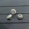 Accesorios para joyería DIY colgante de semilla de loto cuentas de loto con agujero pasante colgante vintage de plata tibetana accesorios para pulsera con borla venta al por mayor