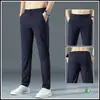 Pantalones casuales de verano para hombre, corte holgado, cintura elástica, pierna recta largos, pantalones de traje negros para primavera y otoño, estilo seda de hielo ultradelgada