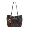 Bolsa Grande Estampa de Leopardo Feminina Nova Outono 2026 Retro Simples de Ombro e Mão Versátil Bolsa Tote para o Dia a Dia