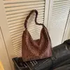 Bolsa feminina com estampa de leopardo única, nova e moderna de 2026, bolsa tote popular super quente para o verão, bolsa de ombro de grande capacidade