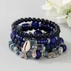 El más vendido en Europa y América: Pulsera con colgante de mariposa de granos de café estilo bohemio, pulsera de cordón elástico multicapa con cuentas