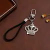Llaveros europeos y americanos más vendidos transfronterizos, colgantes para bolsos, colgantes de moda con incrustaciones de diamantes, colgantes de corona personalizados de lujo, accesorios