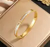 Colección de Pulseras de Acero de Titanio de Lujo Ligero Europeo y Americano Madreperla Números Romanos Diamante Completo Múltiples Estilos Suministro Directo de Fábrica Soporta Dropshipping