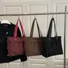Cross-Retro 2026 Otoño Nuevo Estampado de Leopardo Moda Casual Versátil Simple Diseño de Nicho Bolso de Hombro Tote