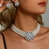 Conjunto de joias de pérolas multicamadas transfronteiriço estilo ins feminino design criativo europeu e americano gargantilha em V pulseira colar brincos