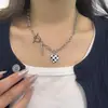 Collar con colgante de amor de tablero de ajedrez, diseño de nicho, moderno y sencillo, para mujer, accesorios de cadena para clavícula.