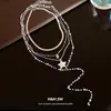 Collar con colgante de corazón de circón con cuentas de perlas estilo coreano, juego de cuatro piezas, cadena para la clavícula de lujo ligero y de alta gama, accesorio versátil para mujer