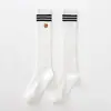 Meias levemente modeladoras, de comprimento até o tornozelo, em estilo outonal e preppy, com design texturizado, feitas de algodão penteado, com propriedades antiderrapantes e detalhes bordados, adequadas para uniformes JK