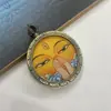 Estilo Étnico Aleación Impresión Vintage Pintura de Nepal Caja Dios Amarillo de la Riqueza Ojo de Dharma Redondo Colgante Thangka Envío Generacional Cordón
