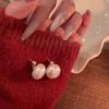 Pendientes de perlas de frijol rojo de otoño e invierno Pendientes de Año Nuevo para mujer 2023 Nuevas explosiones Pendientes únicos de alta gama Lujo ligero Nicho