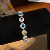 ¡Mar de Glamour en tu Muñeca! Pulsera de lazo ovalado de circón europeo y americano, sensación de lujo ligero y alta gama, joyería de nicho de moda