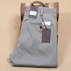 Pantalones rectos de algodón elástico de tela de lyocell fina para primavera y verano para hombre, pantalones casuales de negocios de cintura media de fibra delgada para hombre