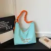 Bolsa feminina casual 2026 nova tendência verão estampa de letras bolsa de ombro bolsa tote de grande capacidade para aula e trajeto