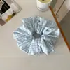 Goma de pelo de cuadros estilo fresco en tonos azules con lazo dulce de niña y pasador de oso lindo para peinados de moño
