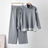 Conjunto de duas peças da moda outono/inverno 2026, transfronteiriço europeu e americano, com suéter de malha de gola alta + calça de perna reta, emagrecedor, para mulheres