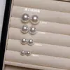 Pendientes de botón de perla S999 plateados por todas partes para mujer, sencillos y elegantes, pendientes de lujo ligero de alta gama, nuevo modelo popular 2026