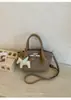 Bolsa Cesta de Moda Transfronteiriça 2026 Novo Modelo Bolsa Feminina com Toque de Luxo, Bolsa de Mão de Luxo Leve, Bolsa Pequena Transversal Exquisita para Senhoras