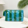 Nuevo neceser de PVC a rayas transfronterizo, bolsa de almacenamiento de artículos de tocador de gran capacidad para viajes a la playa, neceser transparente impermeable