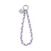 Nuevo estilo de cordón para teléfono para muñeca, cadena de teléfono de alta gama, cordón corto de moda creativo con forma de corazón para funda de teléfono, accesorio para mujer