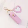 Mini llavero de bolsa para labiales para mujer, bolsa portátil de almacenamiento para labiales con espejo, colgante de llavero, estuche para labiales de tapa abatible