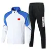 Trajes Deportivos Estilo Chino para Hombre y Mujer de Primavera y Otoño Atuendos de Competición Uniformes de Entrenamiento Deportivo para Estudiantes y Entrenadores Aprobación de Impresión Grupal