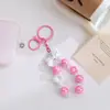 Lindo llavero de gato KT con lazo, cuentas pintadas a mano, colgante lindo para teléfono, accesorio para bolso, decoración de llavero para coche