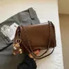 Bolsa de Ombro Casual Grande Capacidade Fashion Simples para o Dia a Dia com Corrente para Mulheres 2025 Outono Novo Estilo Ins Bolsa Tote
