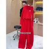 Traje Deportivo Casual Estilo Europeo Rojo para Mujer, Primavera y Otoño 2025 Nuevo Moda Tendencia Holgado Pantalones de Pierna Ancha Conjunto de Dos Piezas